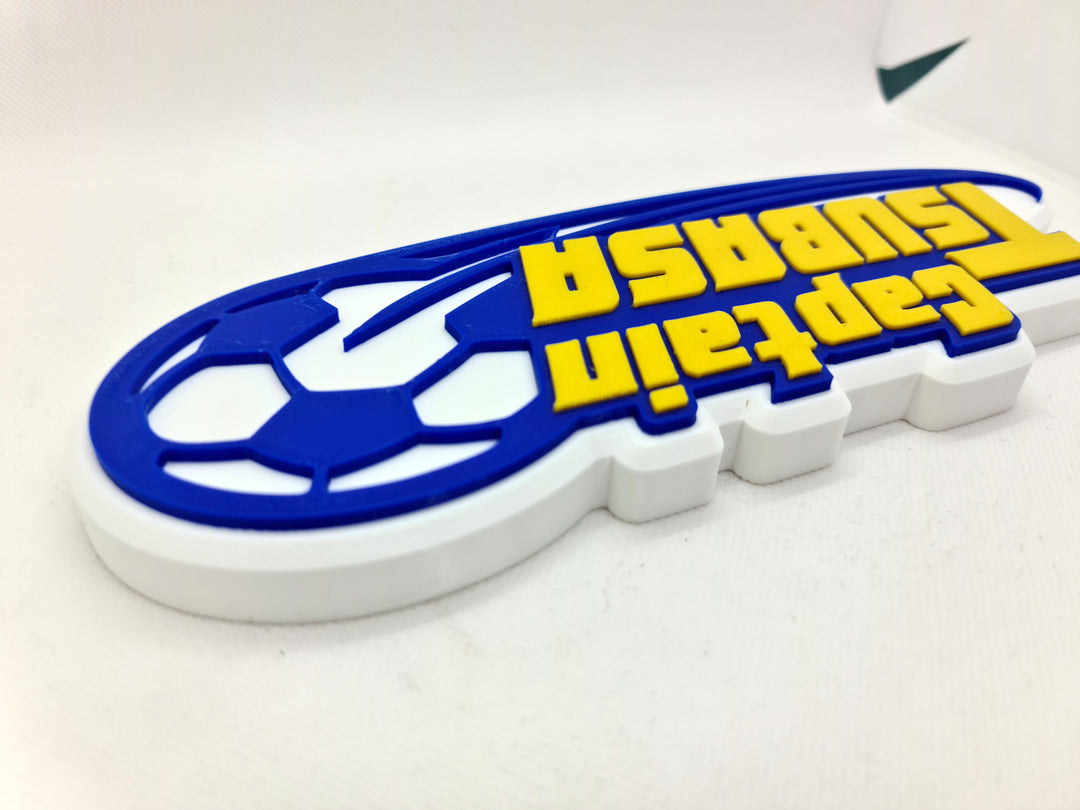 Logo 3D de Captain Tsubasa - ¡Lleva la pasión del fútbol a tu hogar!