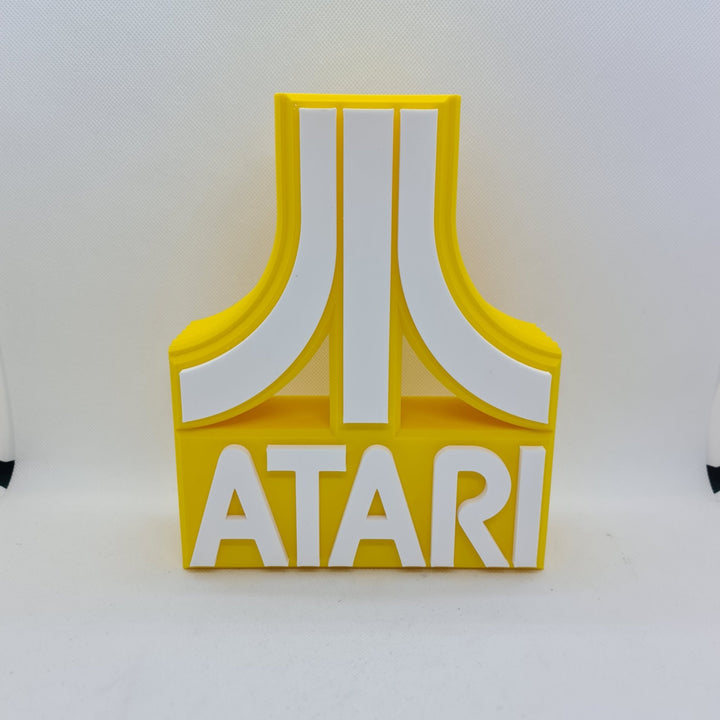 Cartel de sobremesa Atari: Un Viaje Retro al Mundo de los Videojuegos