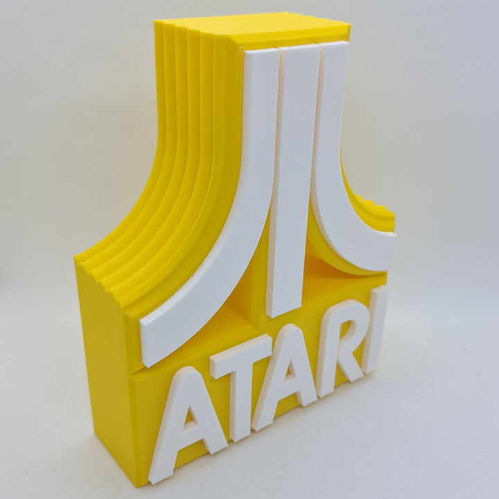 Cartel de sobremesa Atari: Un Viaje Retro al Mundo de los Videojuegos